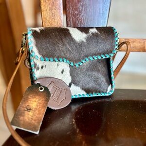 Stylish Cowhide Crossbody Bag with Turquoise Trim
